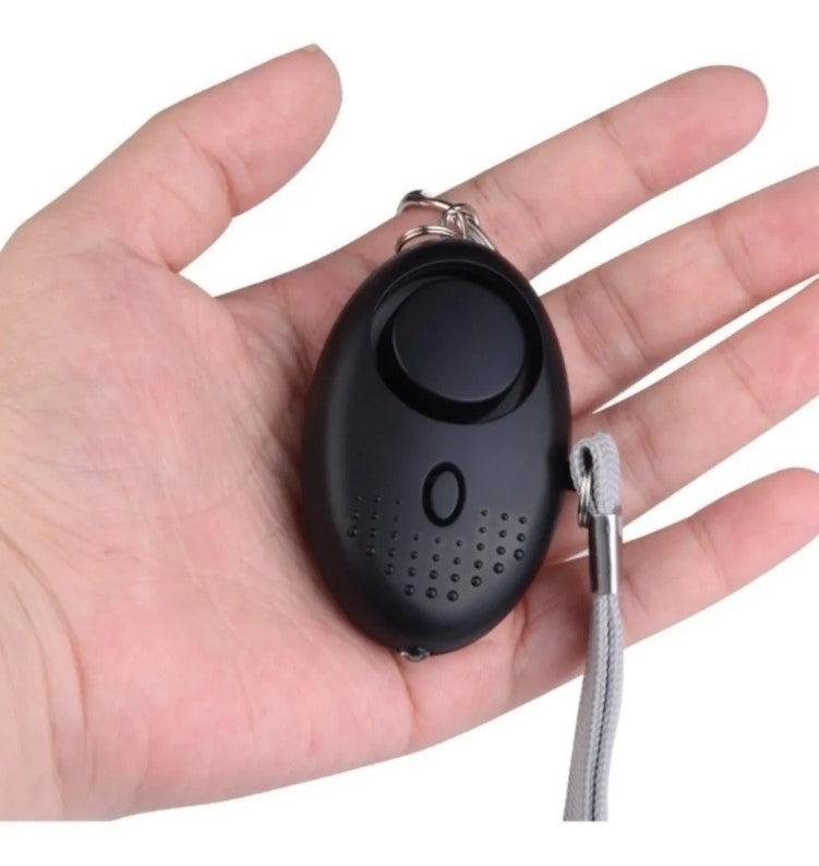 Llavero De Defensa Personal Alarma Panico Sirena Linterna
