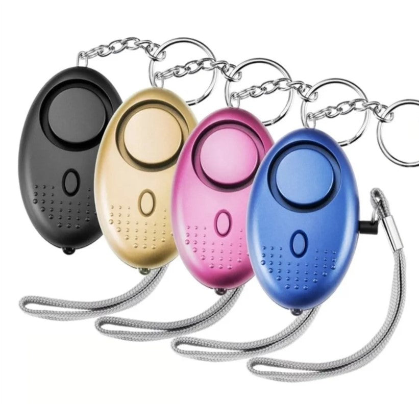 Llavero De Defensa Personal Alarma Panico Sirena Linterna