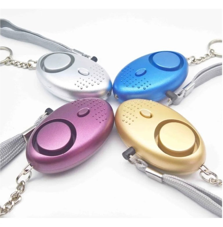 Llavero De Defensa Personal Alarma Panico Sirena Linterna
