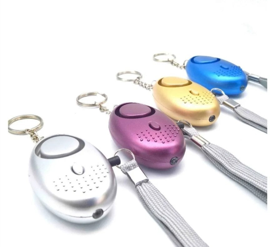 Llavero De Defensa Personal Alarma Panico Sirena Linterna