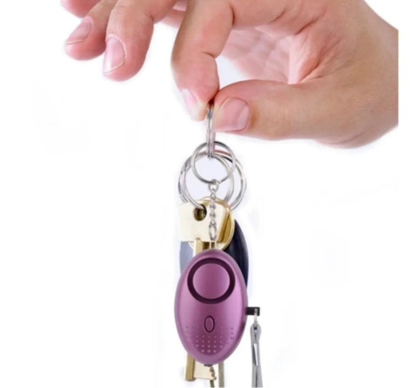 Llavero De Defensa Personal Alarma Panico Sirena Linterna