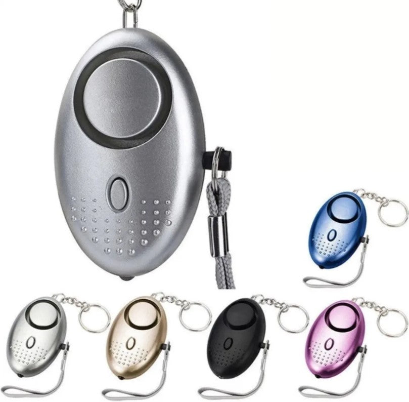 Llavero De Defensa Personal Alarma Panico Sirena Linterna